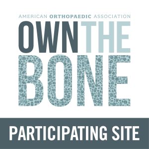 Logo featuring the text "OWN THE BONE" with a textured bone pattern, and "PARTICIPATING SITE" below.